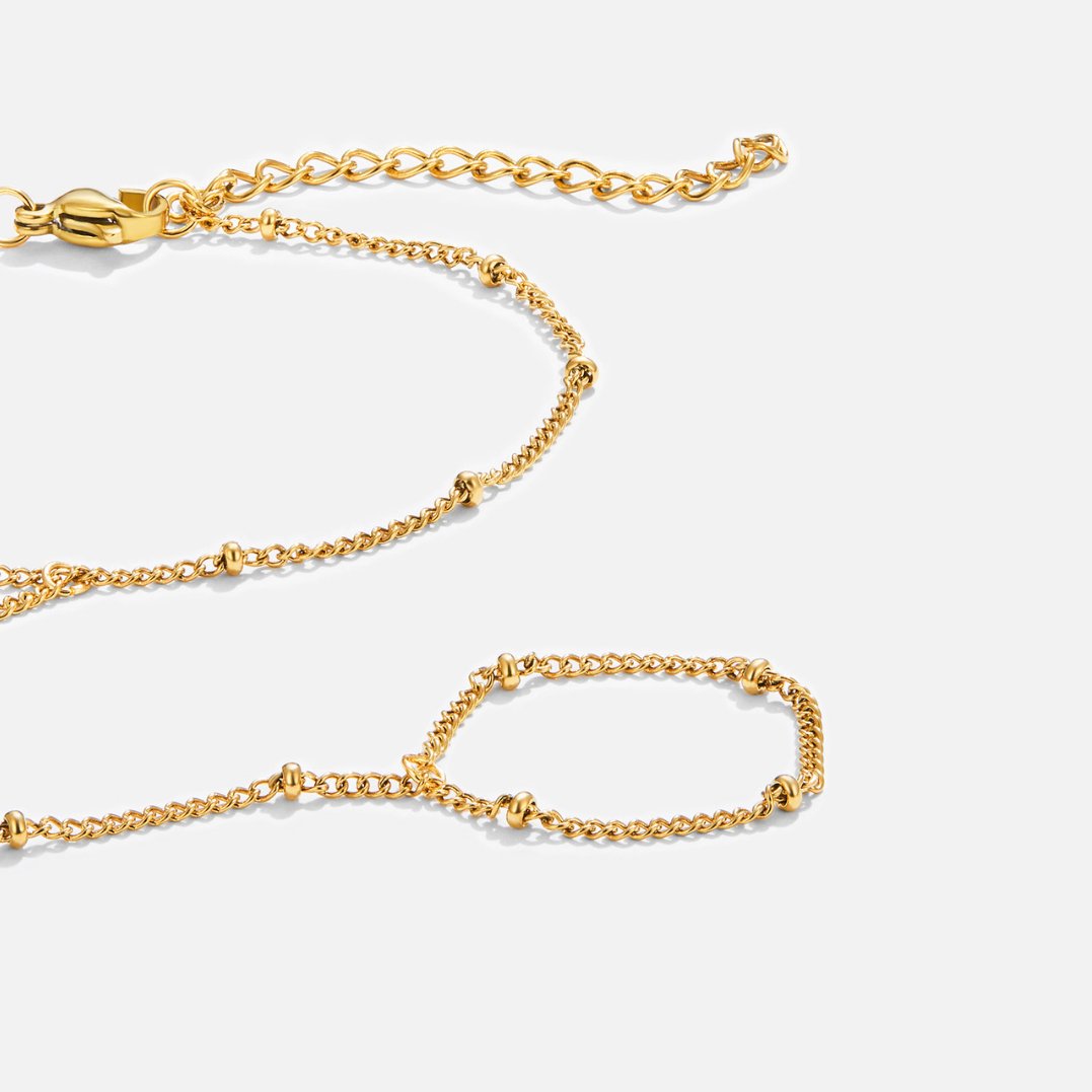Pulsera de mano de oro de 18 quilates