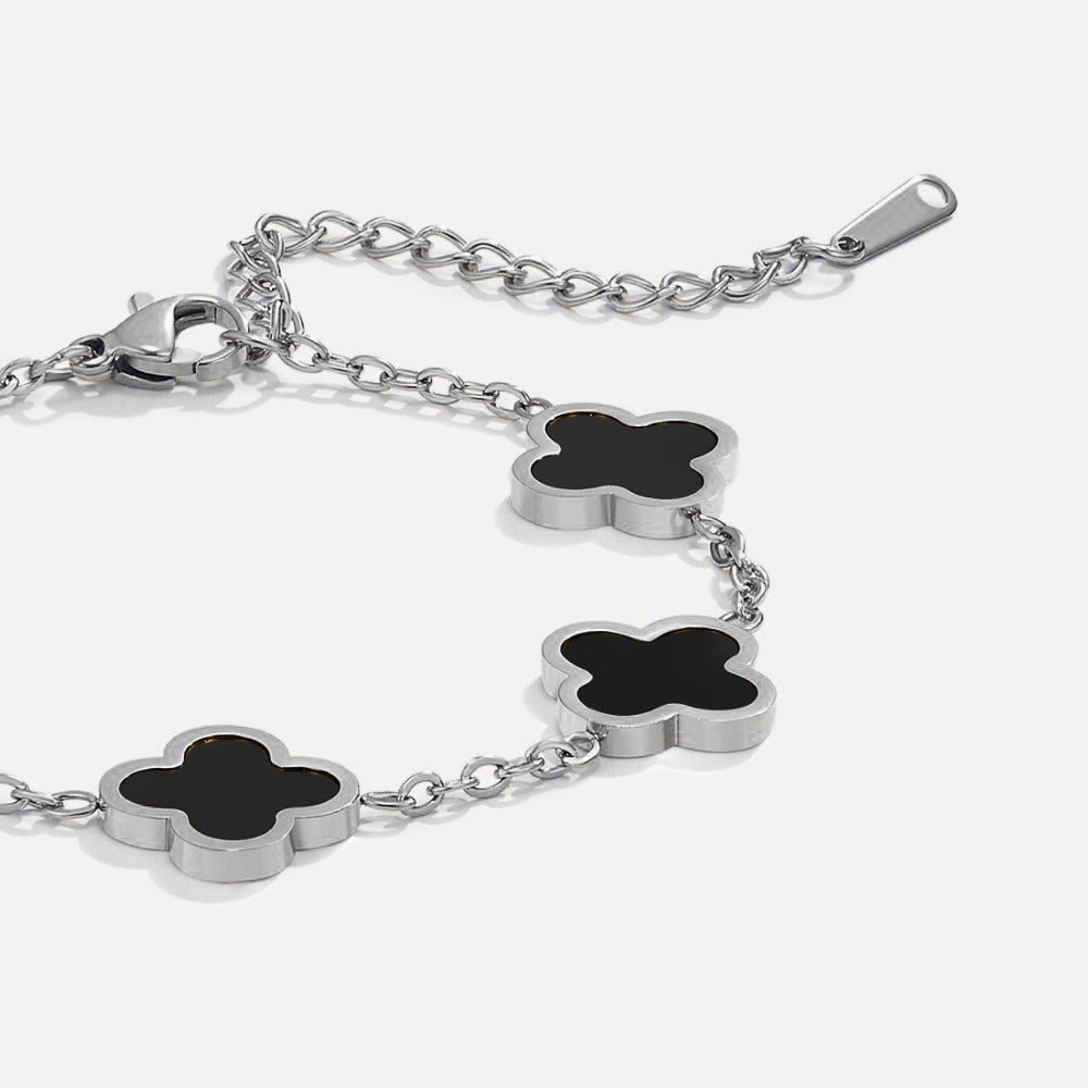 Pulsera de trébol negro de plata
