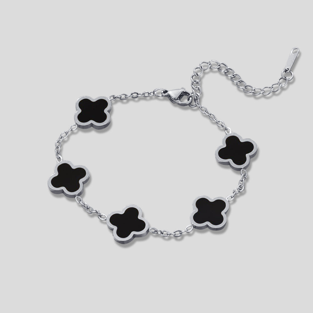 Pulsera de trébol negro de plata