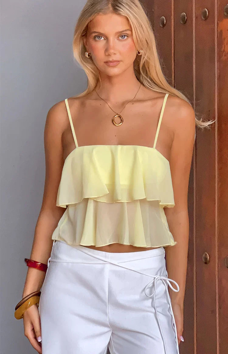 Top Sabina amarillo con volantes