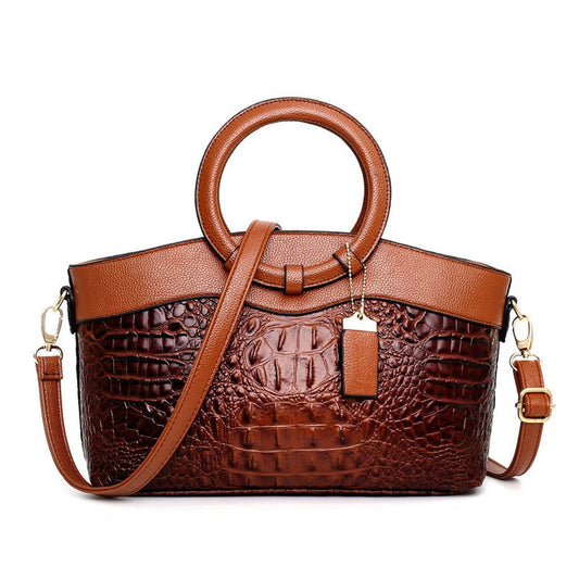 Corven crocodile-embossed leather handbag
