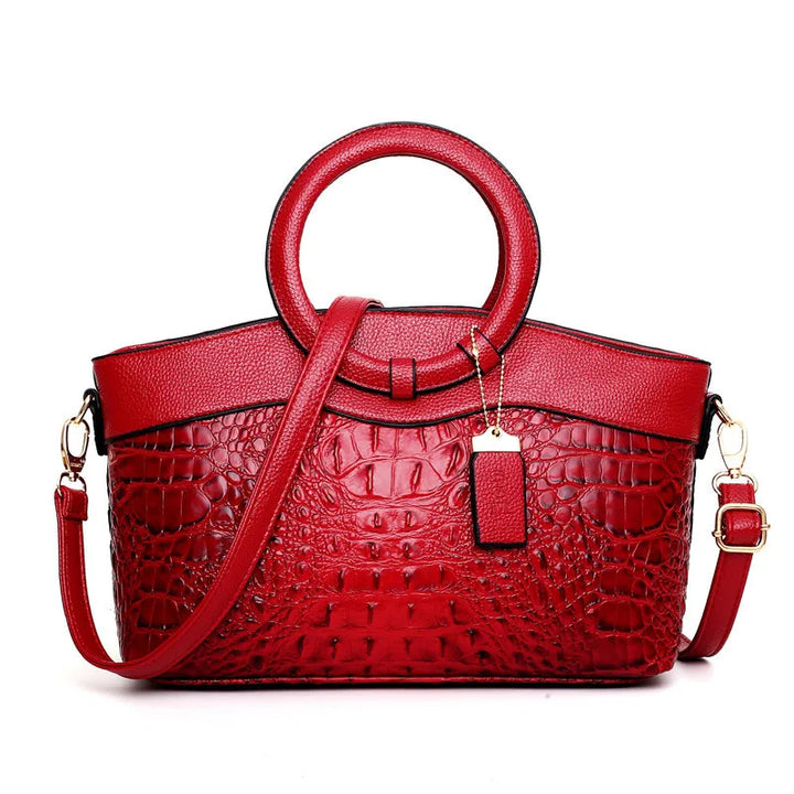 Bolso Corven de piel con grabado de cocodrilo