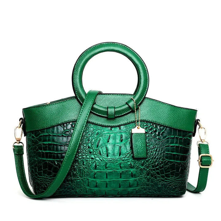 Bolso Corven de piel con grabado de cocodrilo