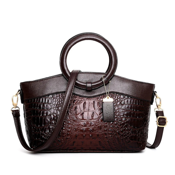 Bolso Corven de piel con grabado de cocodrilo