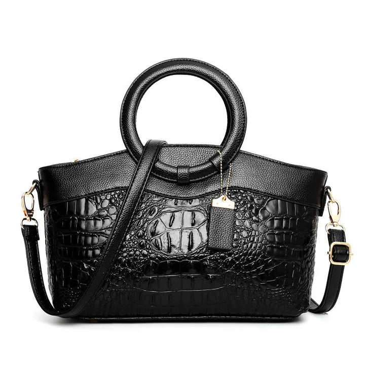 Bolso Corven de piel con grabado de cocodrilo