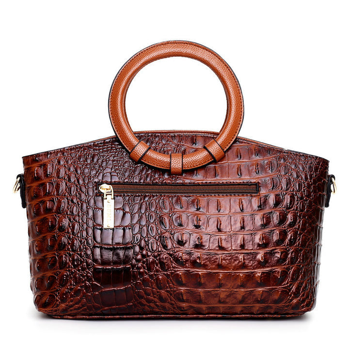 Bolso Corven de piel con grabado de cocodrilo