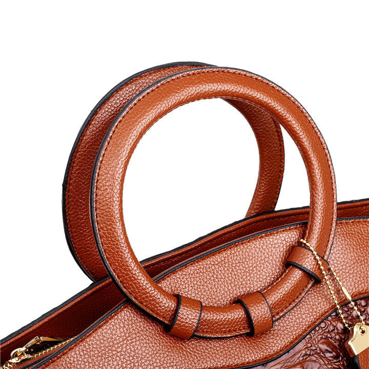 Bolso Corven de piel con grabado de cocodrilo