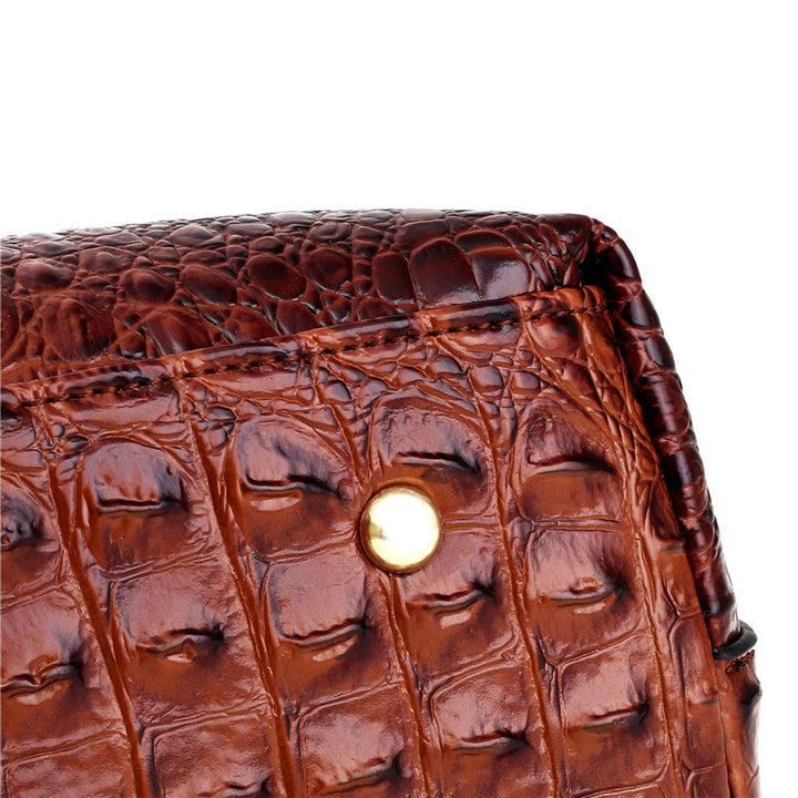 Bolso Corven de piel con grabado de cocodrilo