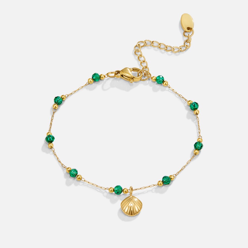 Pulsera  de concha dorada y cuentas verdes